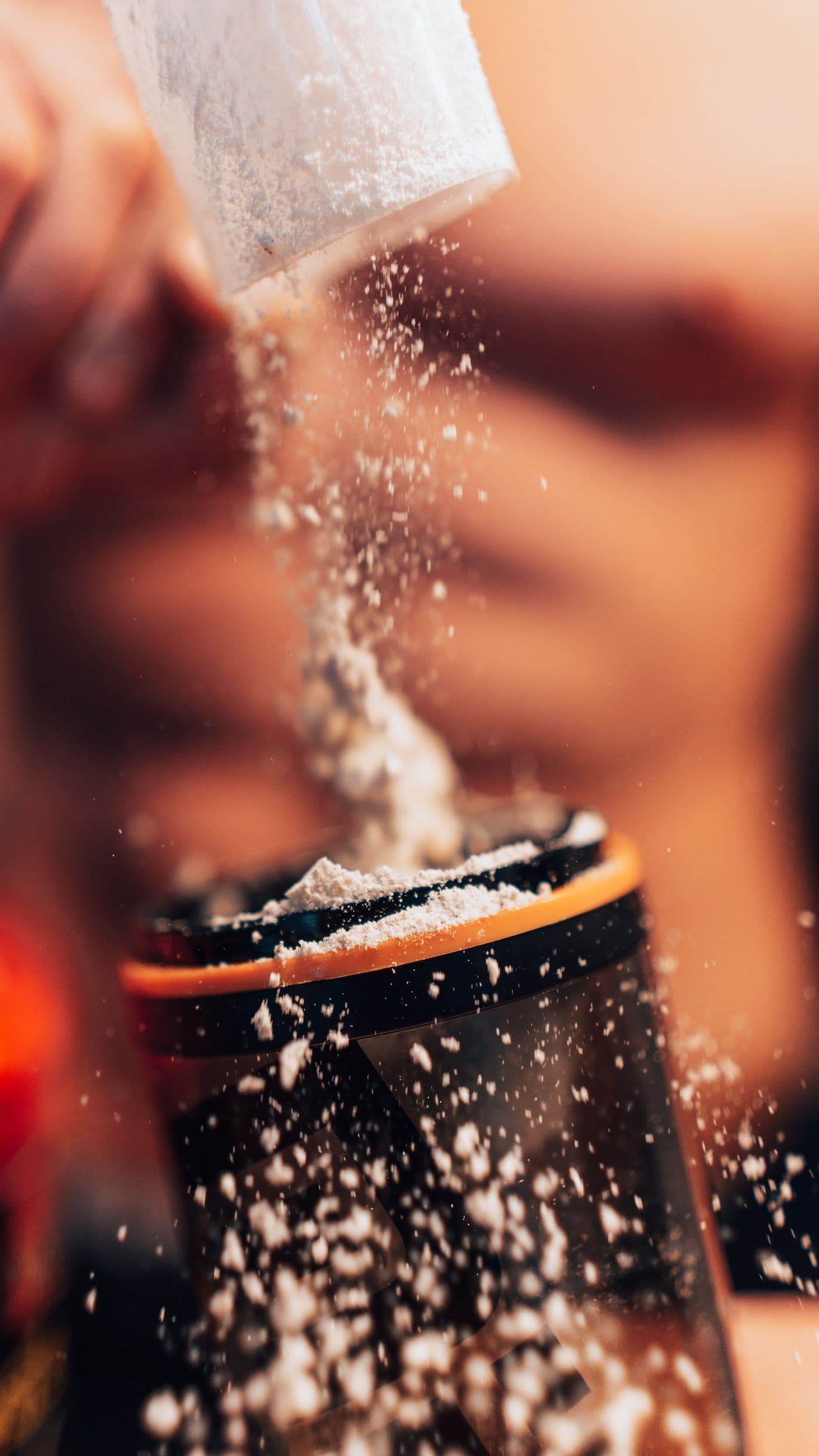 Protein powder being prepared in a shaker